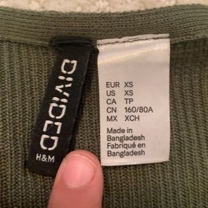 Cropped tight green shirt